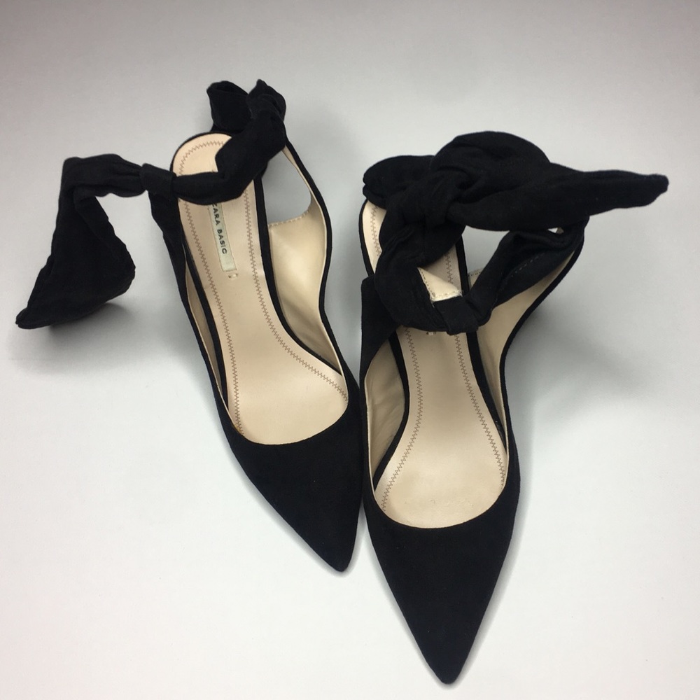 Black suede pointed toe heels